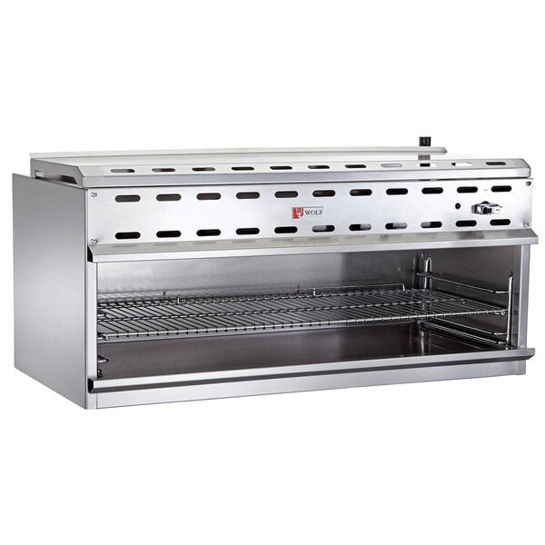 A stainless steel Wolf cheese melter with a rack.