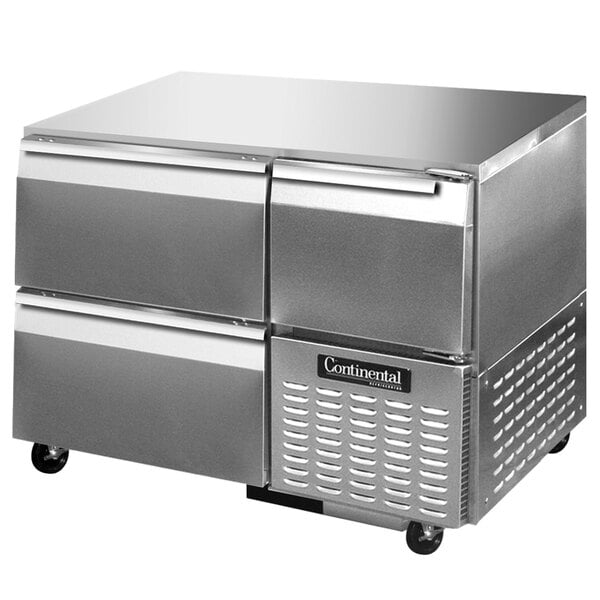 A stainless steel Continental Refrigerator with two drawers and one half door.