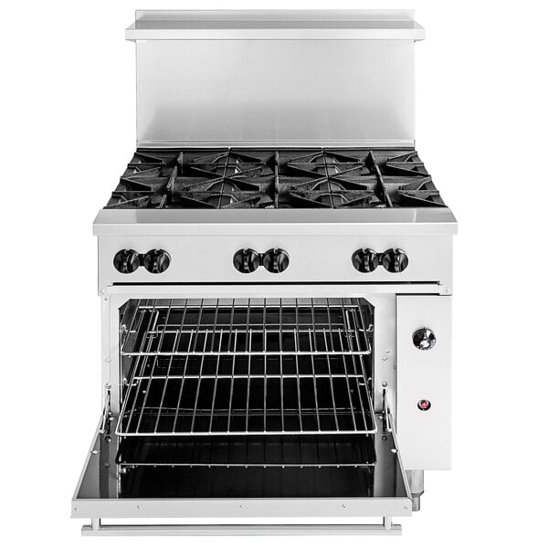 The open door of a Wolf Challenger XL liquid propane range.