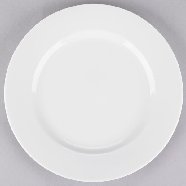 A white 10 Strawberry Street porcelain lunch plate with a white rim on a white surface.