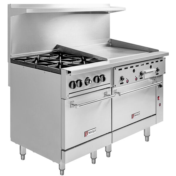 A large stainless steel Wolf commercial gas range on a counter.