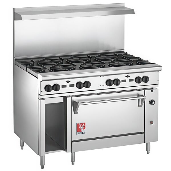 A large stainless steel Wolf commercial range with 8 burners and a standard oven.