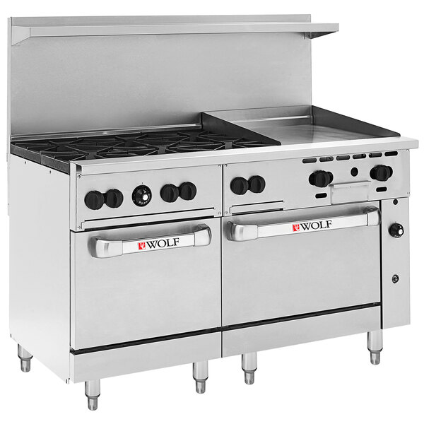 A large stainless steel Wolf Challenger commercial range with two ovens, six burners, and a griddle.