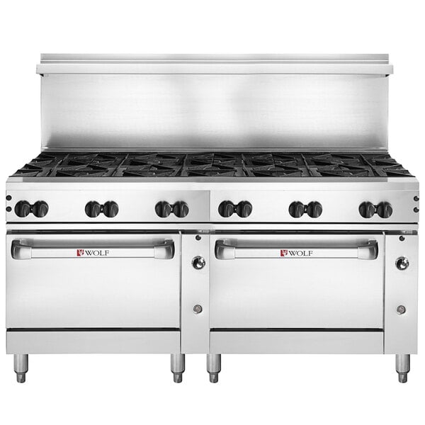 A Wolf stainless steel commercial gas range with 12 burners and 2 standard ovens.
