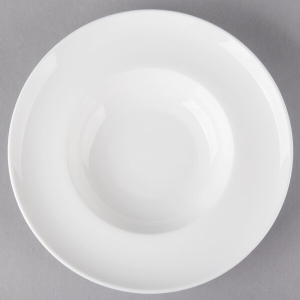 A white round rim porcelain soup bowl.
