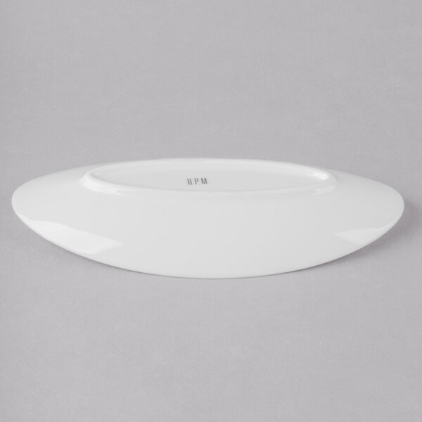 A white oval 10 Strawberry Street Ricard porcelain plate.