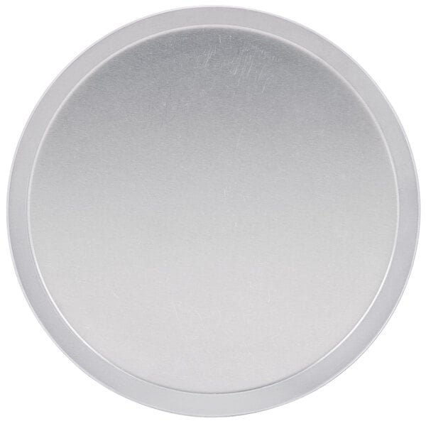 An American Metalcraft heavy weight aluminum pizza pan with a silver circle on it.