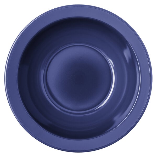 A dark blue Carlisle polycarbonate monkey dish.