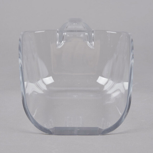 A clear plastic container with a clear plastic scoop inside.