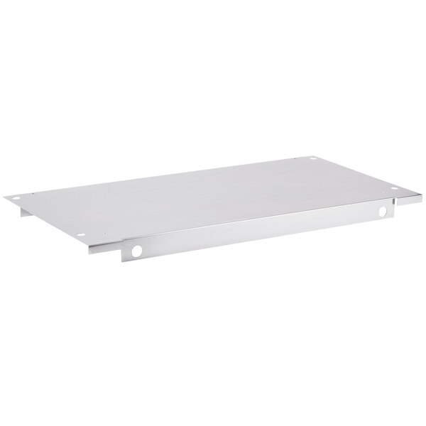 A stainless steel Wolf bottom panel with holes.