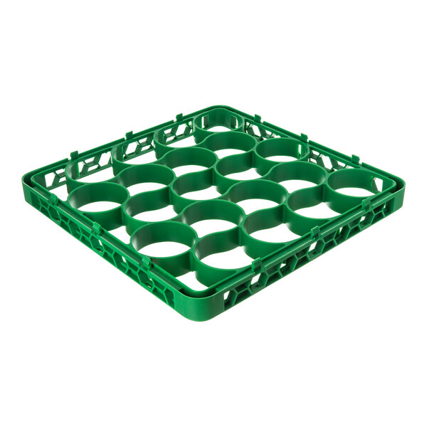 A green plastic glass rack extender with 20 circular compartments for organizing and washing glassware.