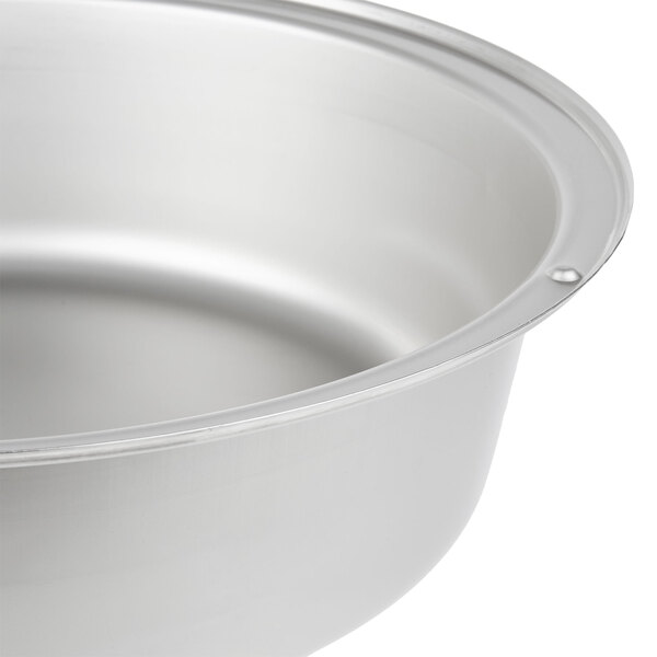 A close-up of a stainless steel water pan for a Vollrath Royal Crest Chafer.