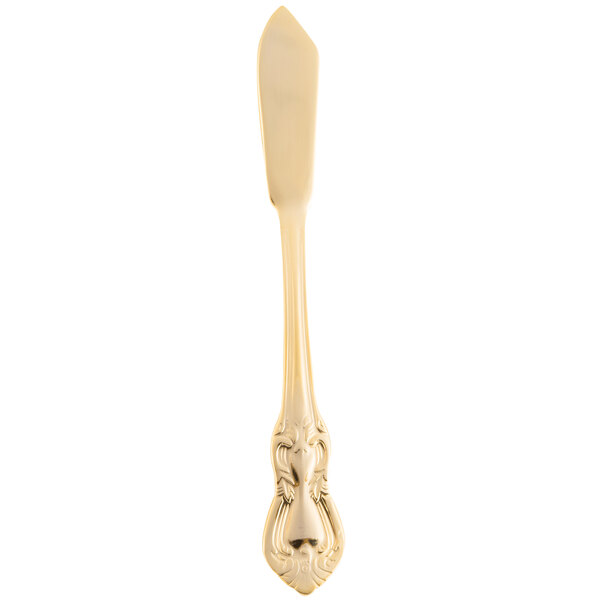 A 10 Strawberry Street Crown Royal gold plated stainless steel butter knife with a long handle.