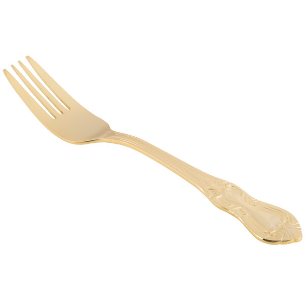 A close-up of a 10 Strawberry Street Crown Royal gold plated salad fork with a handle.