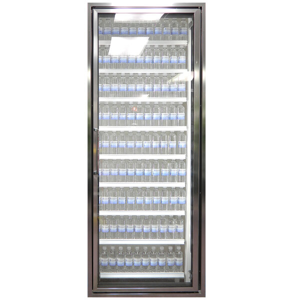 A Styleline walk-in cooler door with shelving full of water bottles.