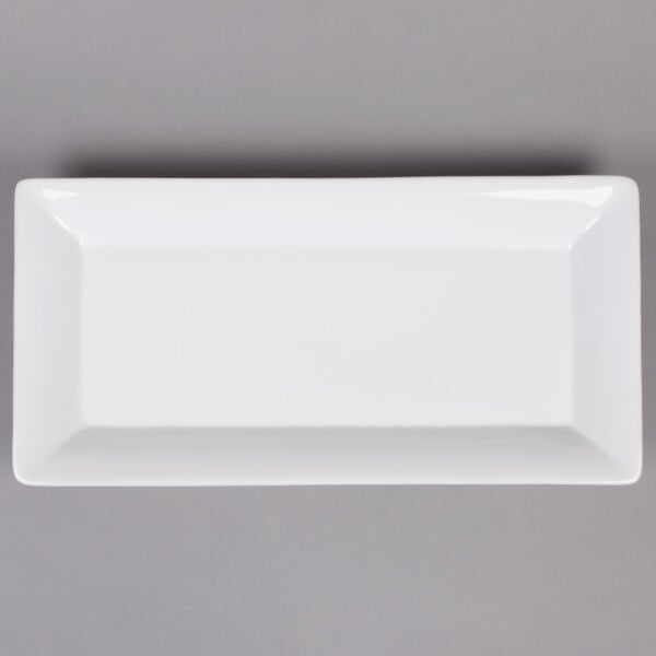 An American Metalcraft white rectangular stoneware platter on a gray background.