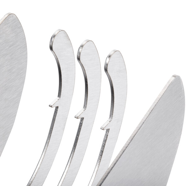 A close-up of a metal Edlund ARC! 1/4" pusher head assembly.