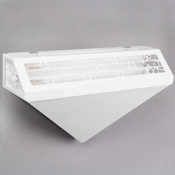 A white Curtron insect trap wall sconce on a grey surface.