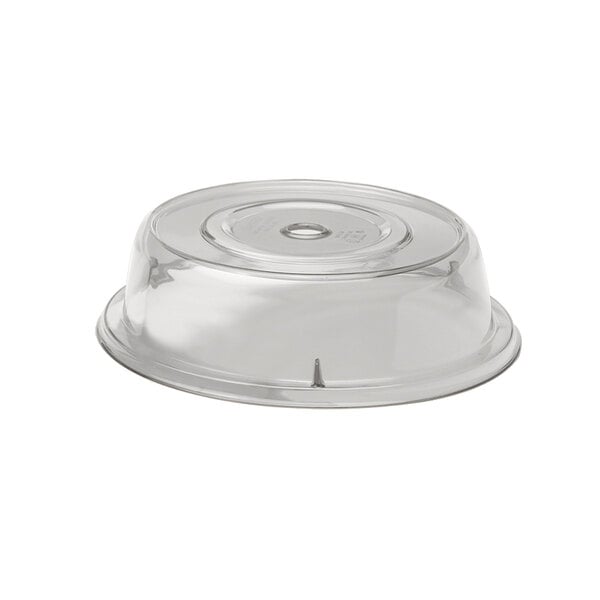 A clear plastic lid with a hole covering a plate.