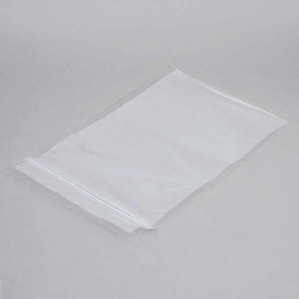 A white plastic bag with a zipper on a white surface.