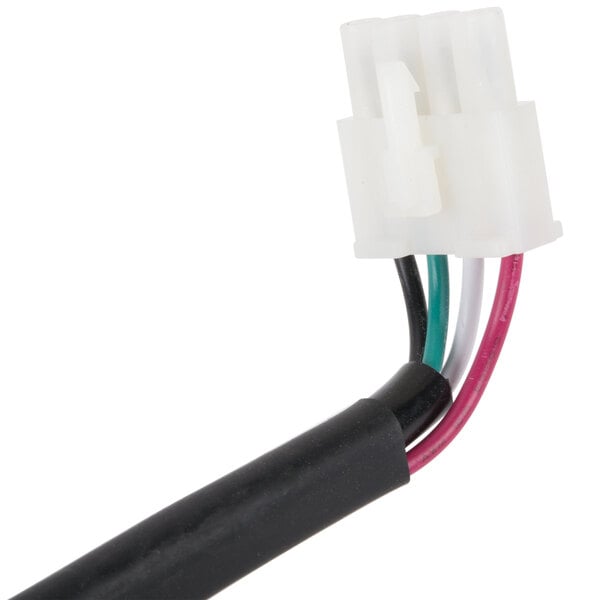 A close-up of a Hoshizaki condensate drain pump's white wire with a black connector.