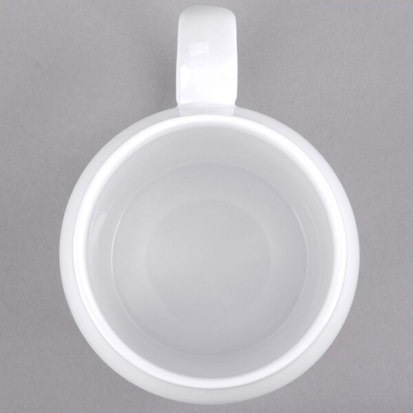 A white Cambro porcelain mug with a handle.