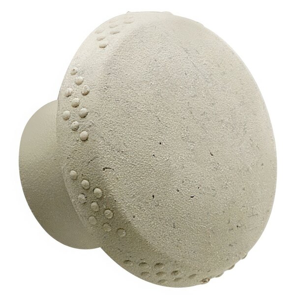 A close-up of the beige Commercial Zone screw with holes.
