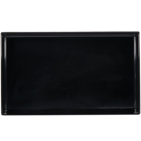A black rectangular object with a white background.