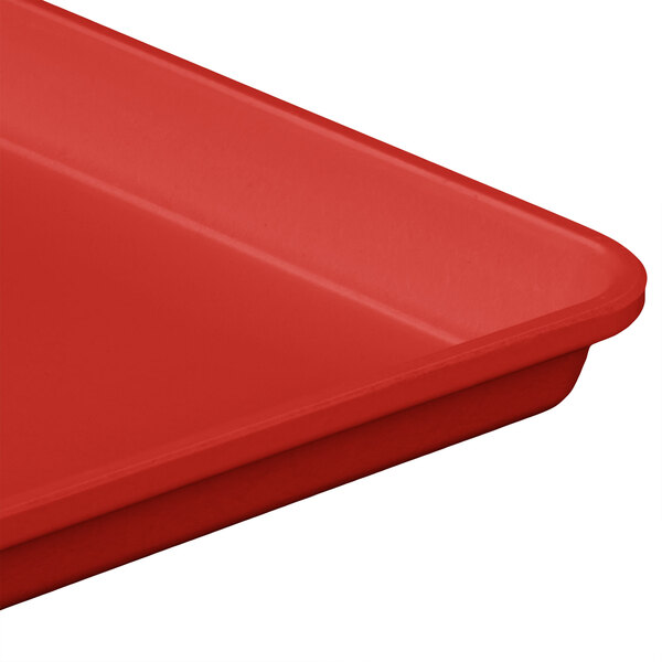 A red MFG Tray fiberglass display tray with a corner.