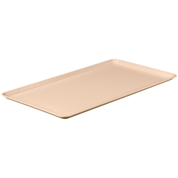 A MFG Tray rectangular peach fiberglass display tray.