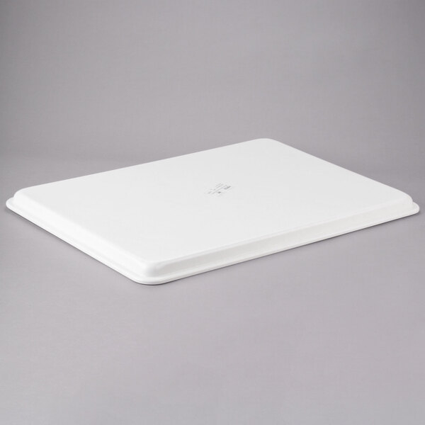 A white rectangular MFG fiberglass display tray.