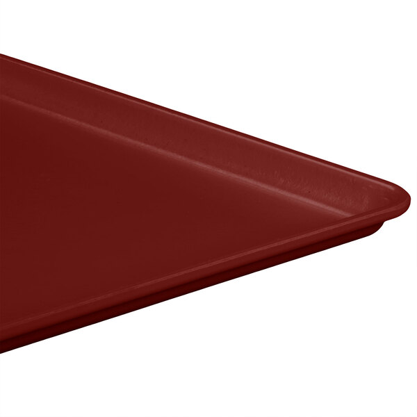 A burgundy rectangular MFG Tray for display.