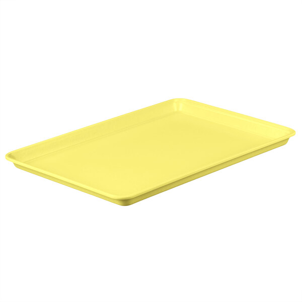 A yellow rectangular MFG Tray on a white background.