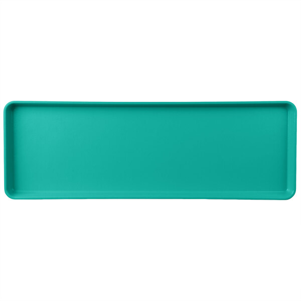 A mint green rectangular MFG Tray with a white border.