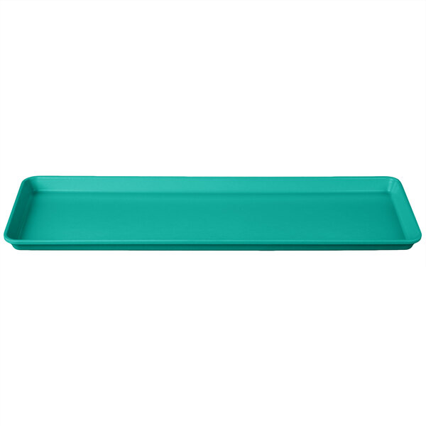 A mint green rectangular MFG Tray with a handle.