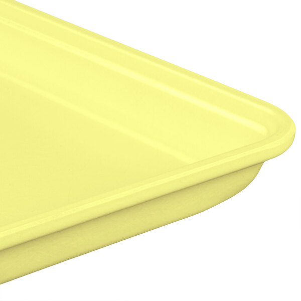A yellow fiberglass MFG Tray display tray.