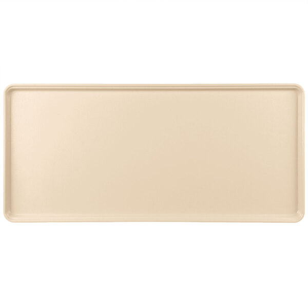 A beige rectangular MFG Tray with a white border.