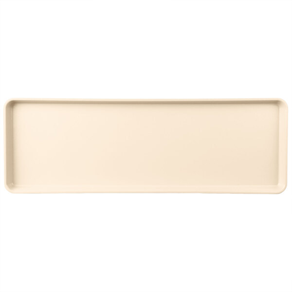 A beige rectangular tray with a white border.