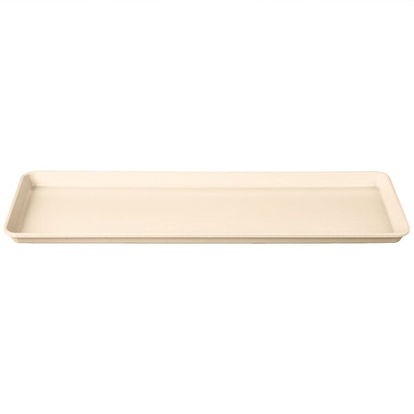 A beige rectangular MFG Tray with a white surface.