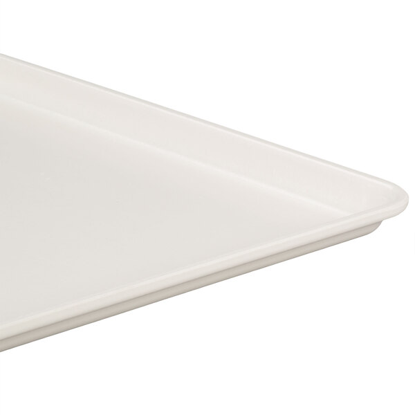 A close-up of a white MFG Tray fiberglass display tray.
