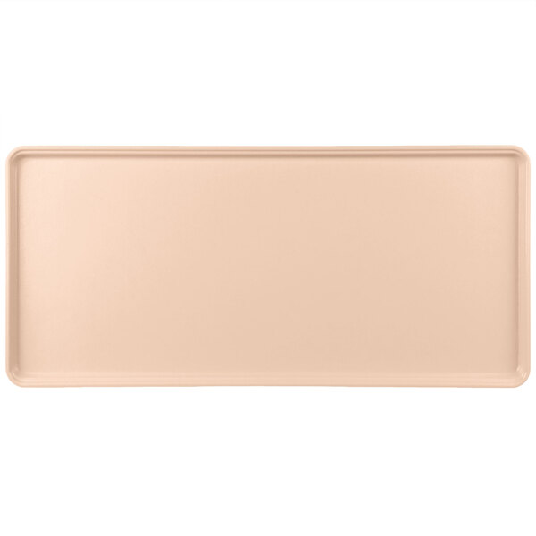 A peach rectangular MFG Tray display tray.