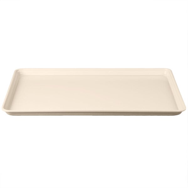 A beige rectangular MFG Tray with a black border.
