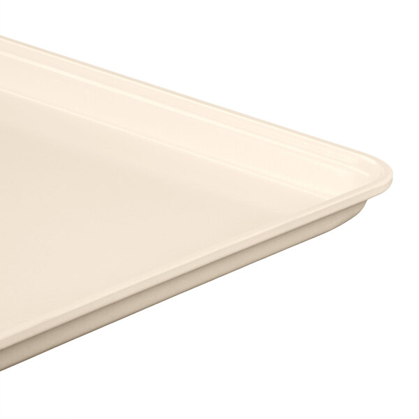 A close up of a beige MFG Fiberglass Supreme Display Tray.
