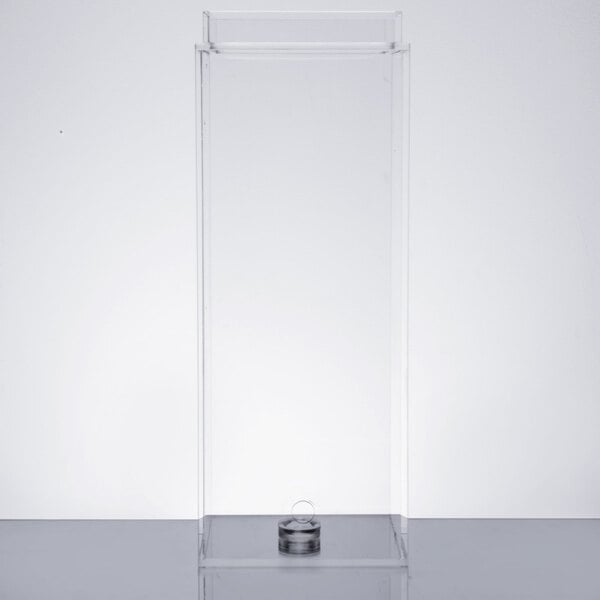 A clear rectangular acrylic chamber with a black border and a small round metal lid.