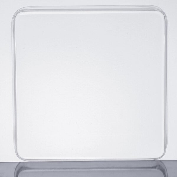 A clear square Cal-Mil beverage dispenser lid.