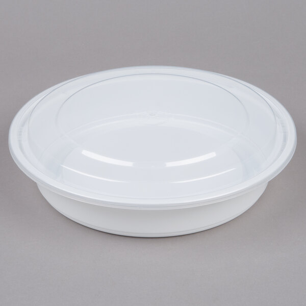 A white plastic 9" round microwavable container with a clear lid.