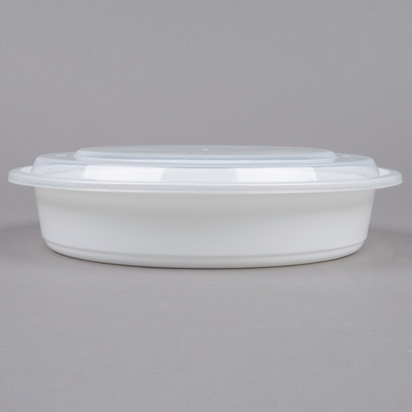 A 48 oz. white plastic round microwavable container with a lid.