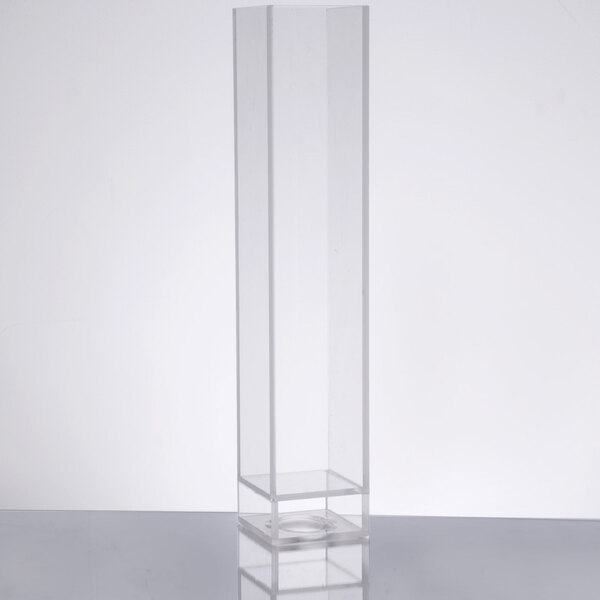 A clear rectangular ice chamber.