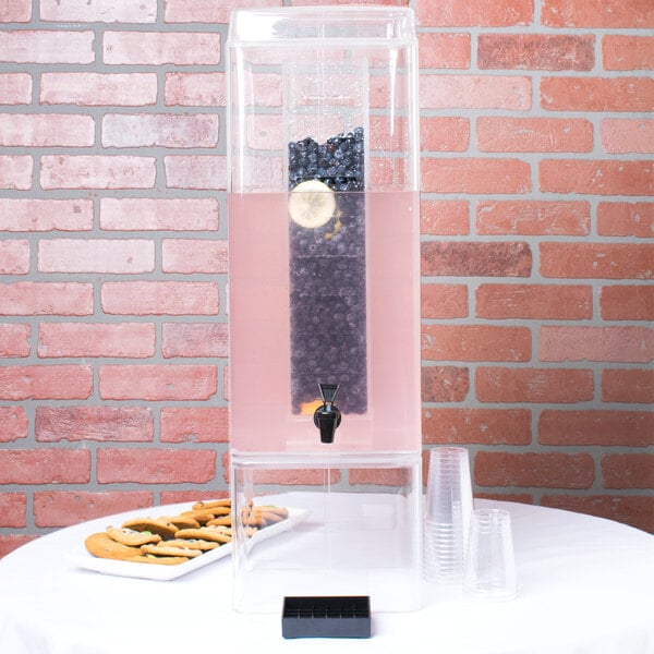 A black plastic infusion chamber for a Cal-Mil beverage dispenser.