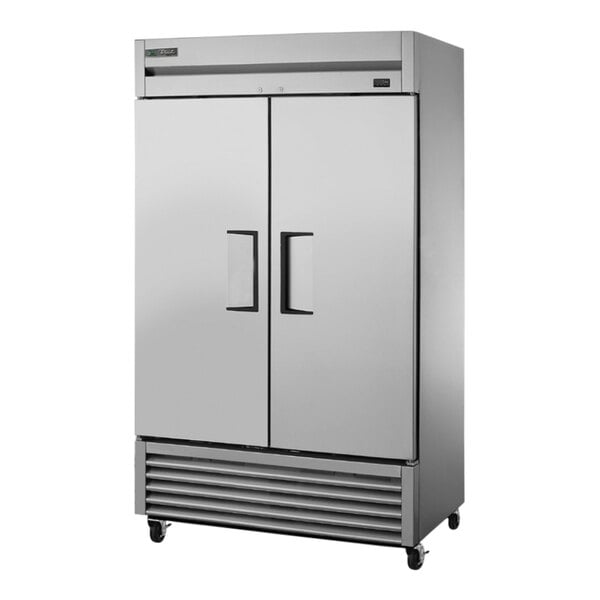 A True stainless steel reach-in freezer with two doors.